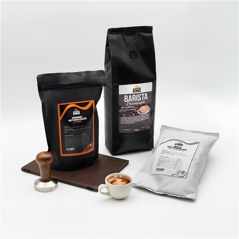 Three coffee products including a bag of hot chocolate, a bag of coffee beans, and a package of coffee powder on a white background.