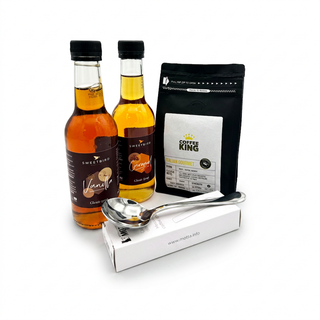 The Caramel Latte at Home Starter kit contents: Sweetbird Vanilla and Caramel Syrups, Coffee King Italian Gourmet coffee beans and Motta cupping spoon