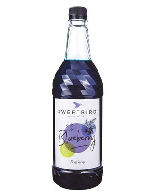 Bottle of Sweetbird Blueberry fruit syrup on a white background