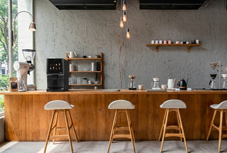 Azkoyen Vitro S1 Espresso self-service coffee machine on a café coffee bar