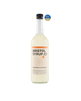 Bottle of Bristol Syrup Co. No.11 Pineapple & Coconut Syrup in a 750ml glass bottle for ube and hot chocolate