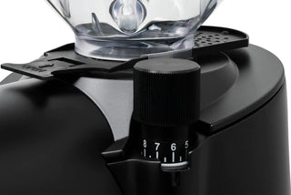 Close-up of the grind adjustment dial on the Eureka Helios 65 coffee grinder in black