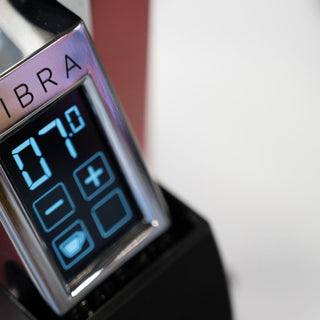 Close-up digital dose display on the Eureka Mignon Libra 65AP