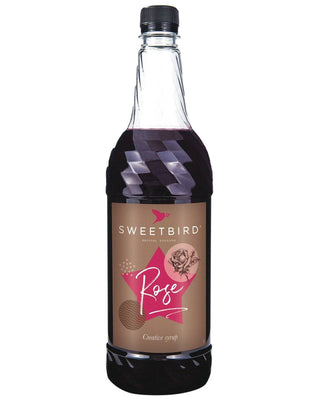 Bottle of Sweetbird Creative Rose Syrup, 1 litre bottle, award-winning botanical rose flavour with vivid pink hue.
