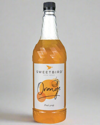 Bottle of Sweetbird Orange Syrup, 1 litre bottle, real fruit juice citrus flavour for coffee and smoothies
