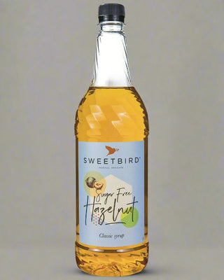 Bottle of Sweetbird Sugar Free Hazelnut Syrup, 1 litre recyclable bottle, nut-free roasted flavour for coffee