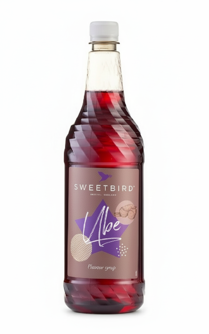 Bottle of Sweetbird Ube syrup on a white background